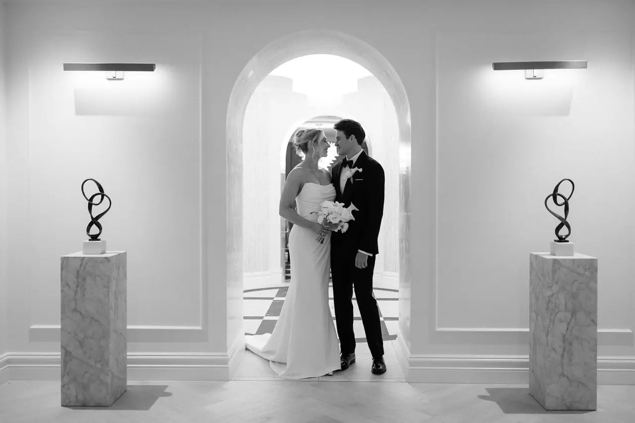 Bride and groom wearing a Germanicos bespoke wedding suit